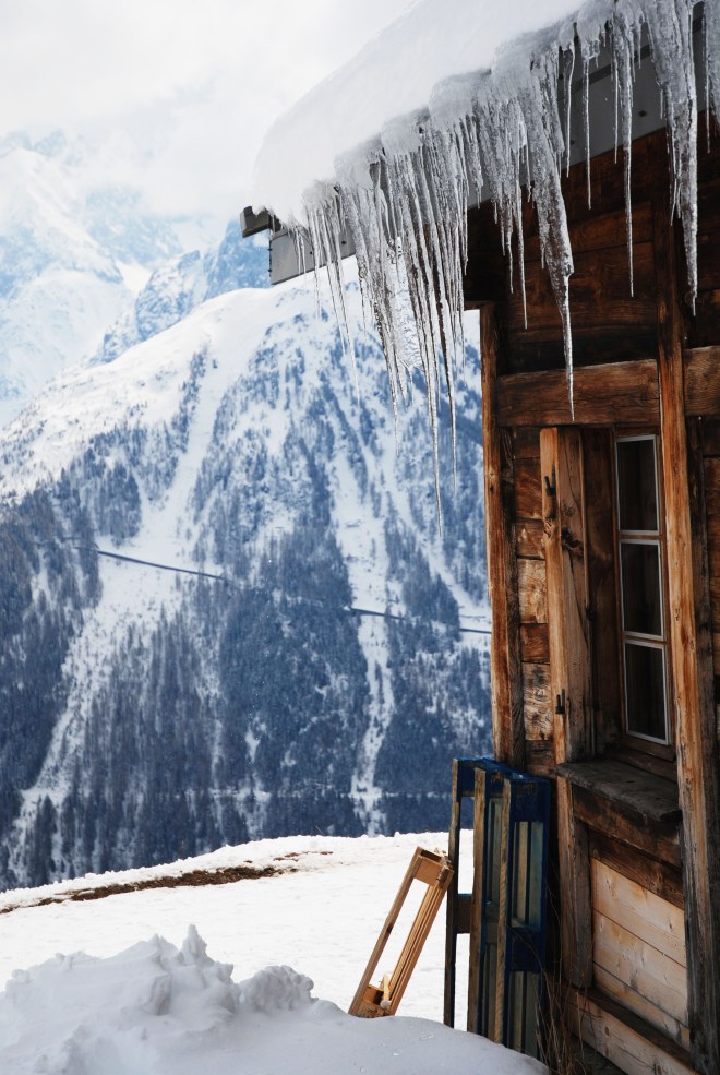 Icicles on a wood cabin