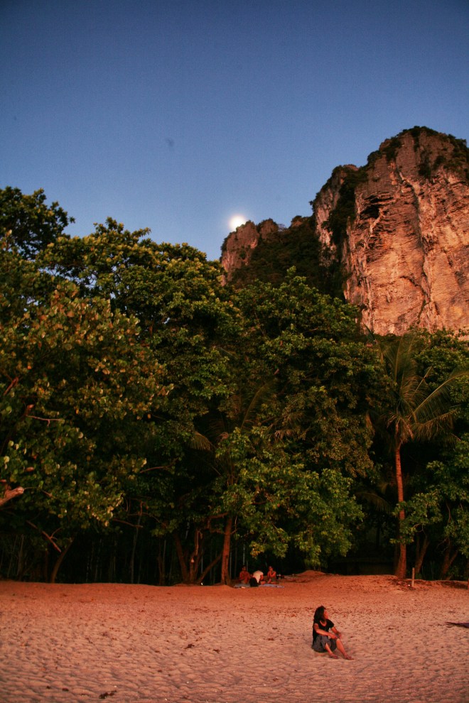 girl on beach at sunset in ao nang