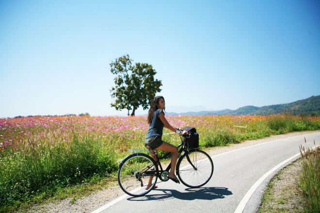 girl on bike in thailand